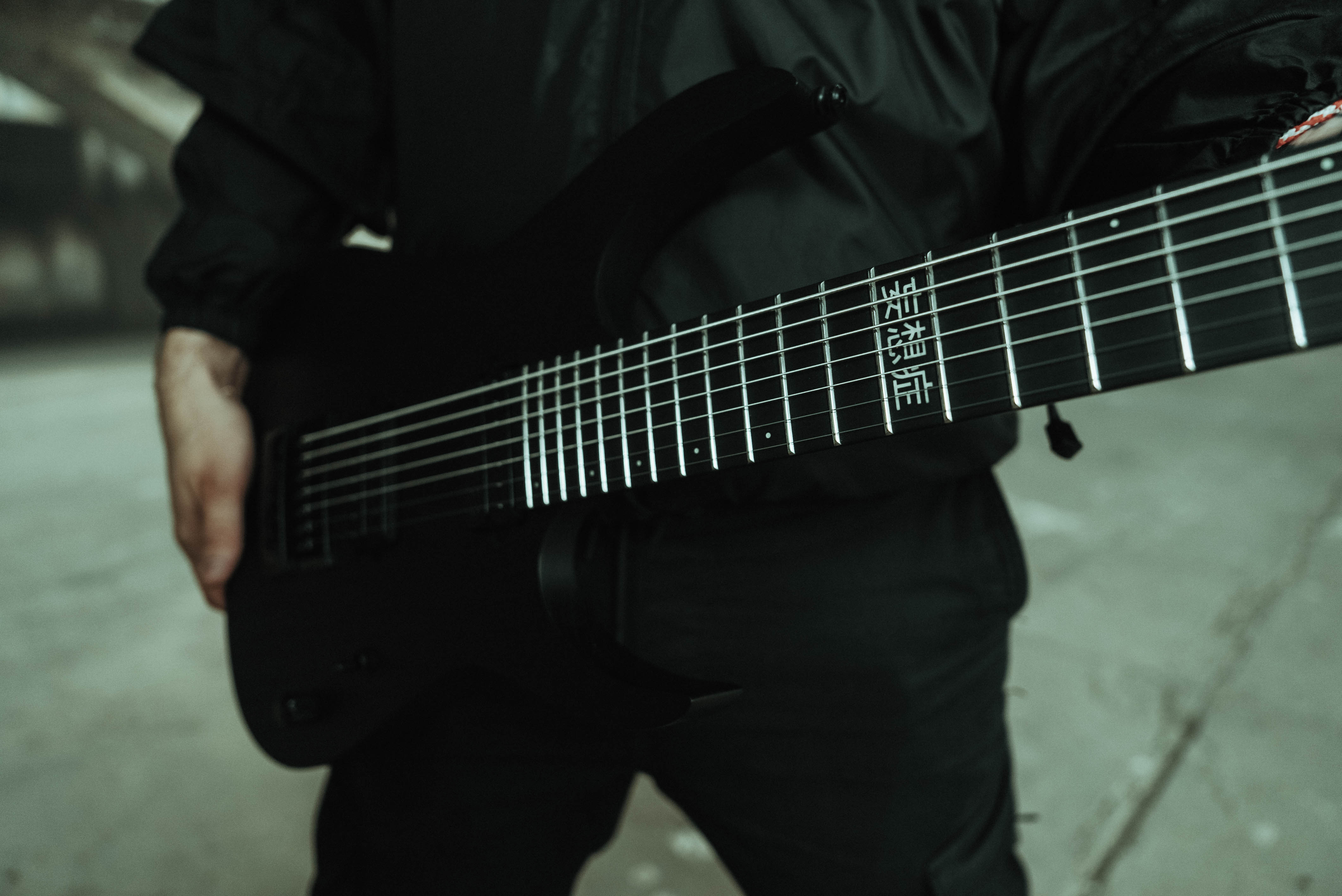 Close-up of a guitar fretboard